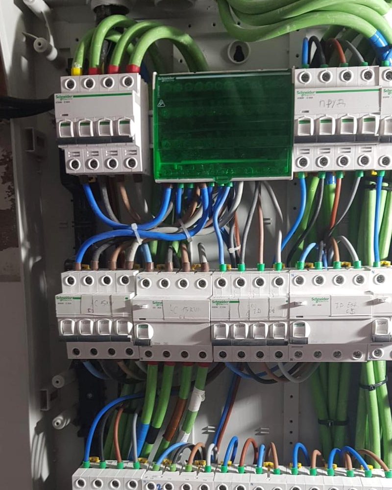Detail of a panel with neat green cabling